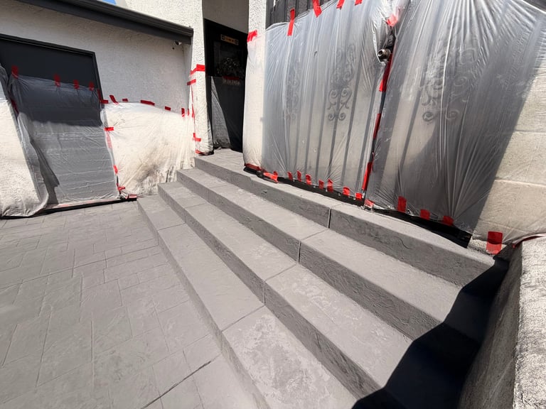Storefront entrance with red and white caution tape blocking doorway and large plastic sheeting covering windows
